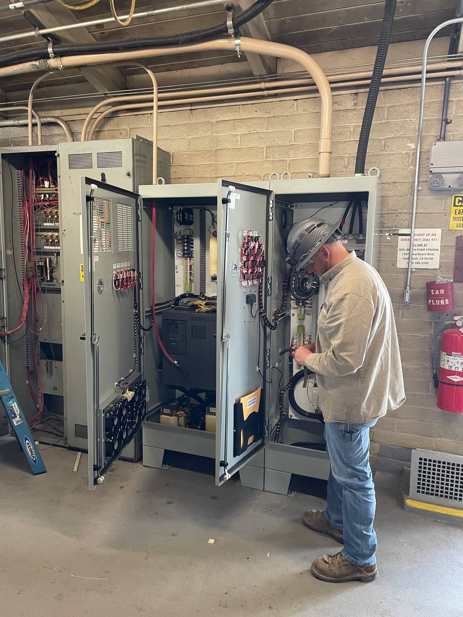 Electrician working on panel